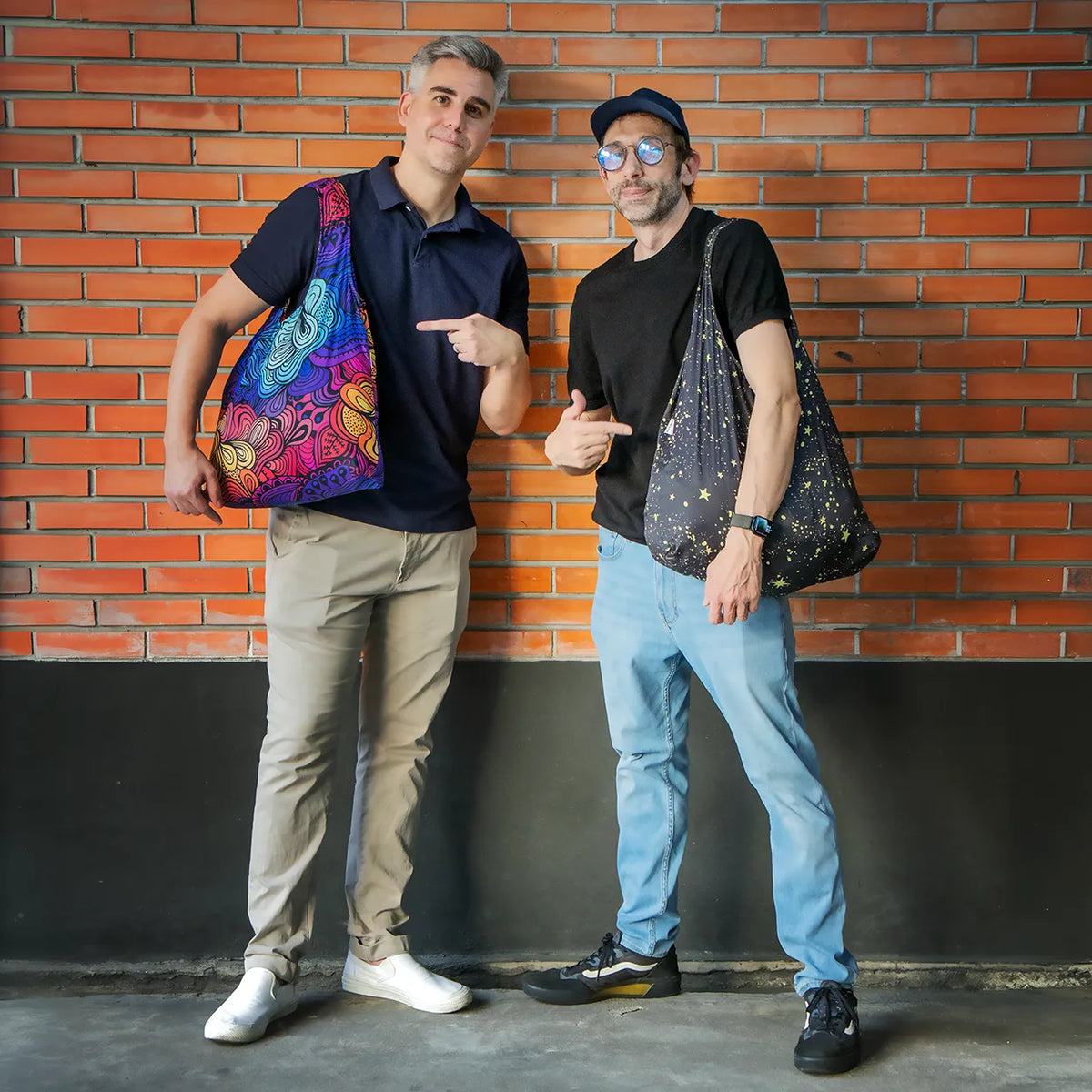 Nanobag founders Ursus Negenborn and Rune Kippervik carrying Nanobags on a rooftop