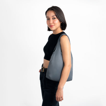 Woman with grey micro nanobag