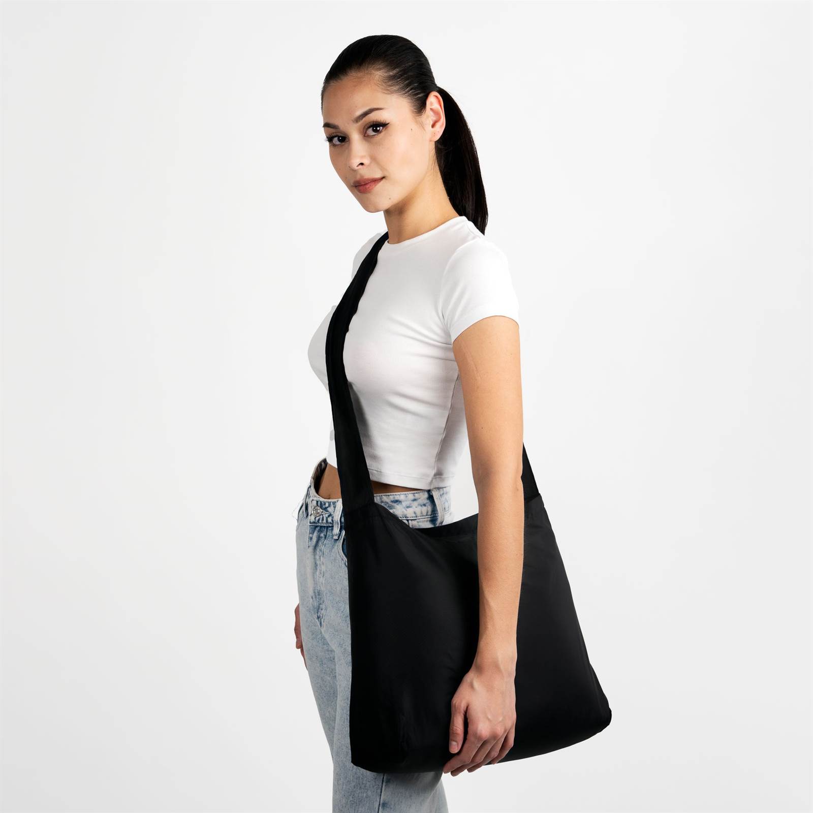 Woman with black crossbody bag nanobag